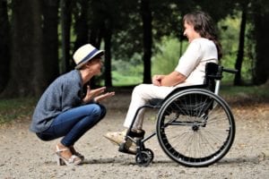 woman-on-black-folding-wheelchair