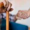 elderly hand support ndis