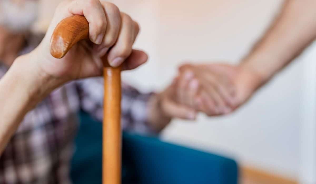 elderly hand support ndis